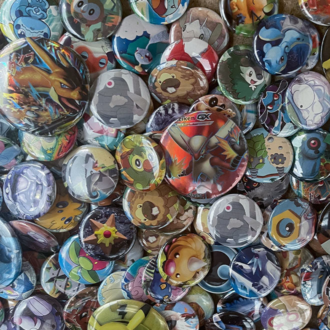 Pokemon - Mystery Badge Bundle - Guaranteed V Card