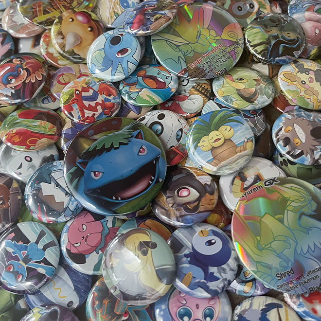 Pokemon - Mystery Badge Bundle - Guaranteed V Card